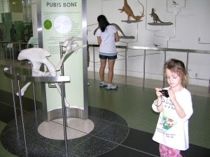 Peo checks her photo of the model.