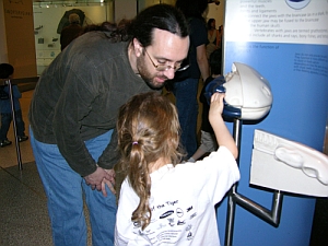 Daddy and Peo Look At Jaws Model